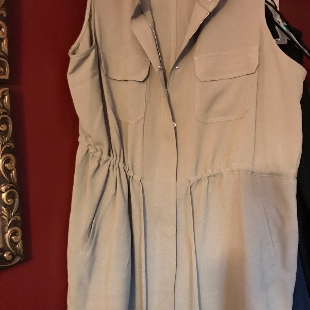 Taupe sleeveless zip up tunic-vest.